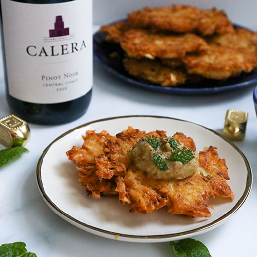 Latkes topped with a smoked eggplant dip