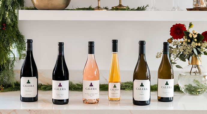 Six Calera Wines on a Christmas counter