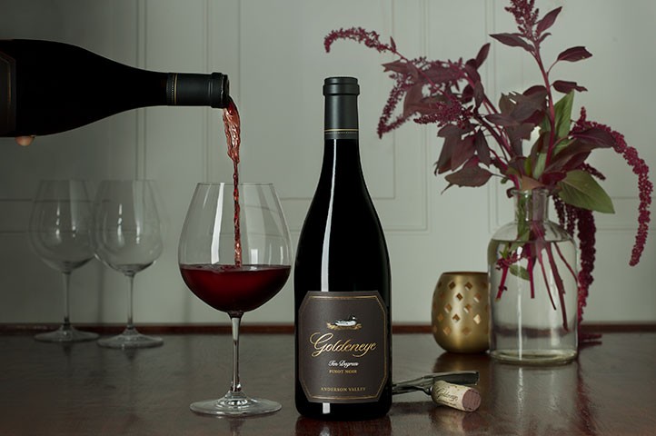 Goldeneye Ten Degrees Pinot Noir being poured